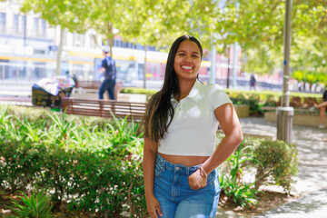 Fototapeta premium Smiling Female University Student in a Park