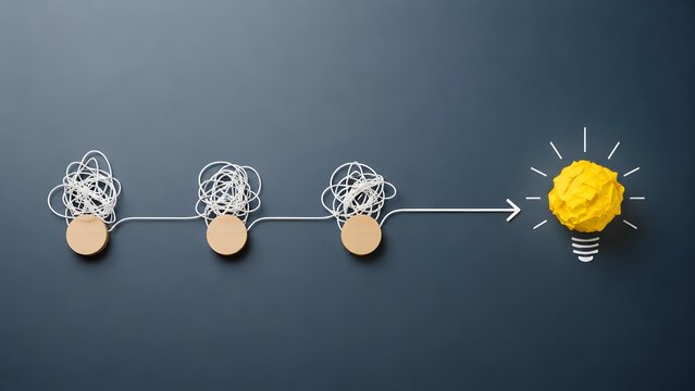 Simplifying complexity and finding solutions showing tangled wires resolving into a bright yellow crumpled paper lightbulb