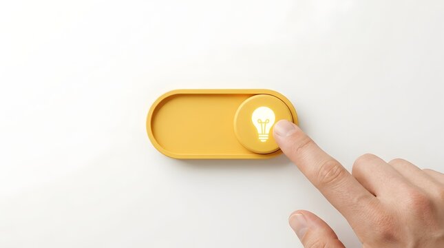 Triggering smart technology solutions showing hand interacting with glowing yellow lightbulb switch for idea generation