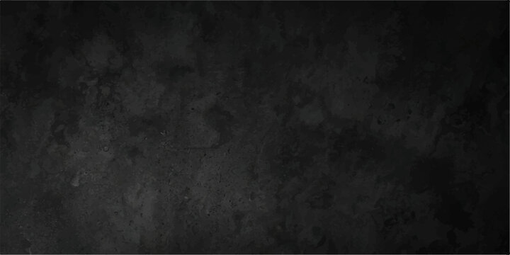 Black grunge texture background with abstract concrete surface, soft center glow and dark moody charcoal mottling for dramatic backdrop