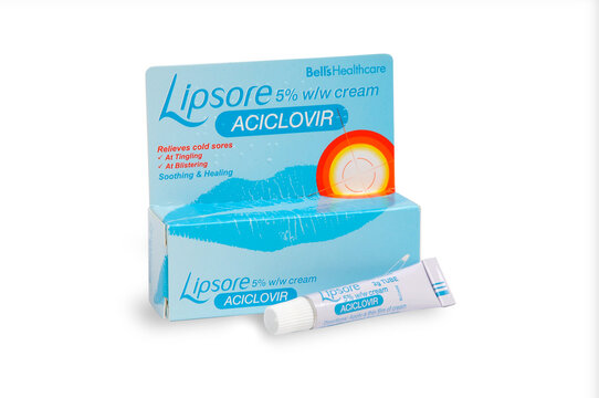 Packaging and tube of Lipsore Aciclovir cream an antiviral medication for treatment of infections caused by the herpes simplex and varicella-zoster viruses, isolated on white background