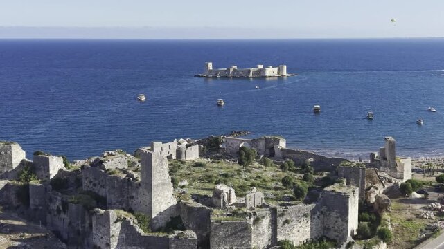 Aerial Drone View of Korykos Castle and Mediterranean Coastline in Mersin, Turkey, Historic Fortress by the Sea at Sunset