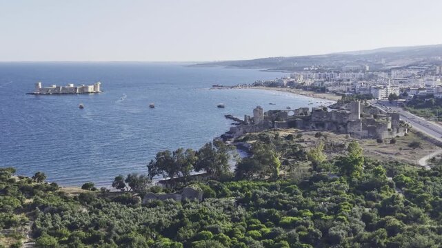 Aerial Drone View of Korykos Castle and Mediterranean Coastline in Mersin, Turkey, Historic Fortress by the Sea at Sunset