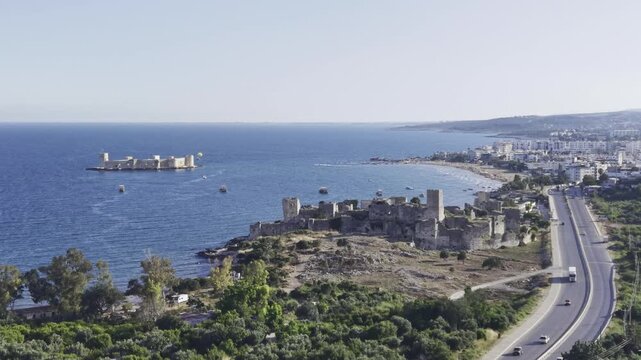Aerial Drone View of Korykos Castle and Mediterranean Coastline in Mersin, Turkey, Historic Fortress by the Sea at Sunset