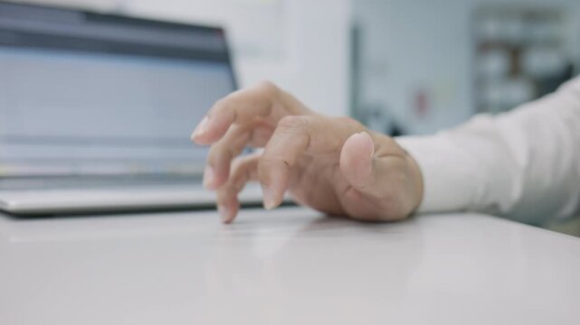 4K60P Close up of male hand tapping fingers on office desk, deep in thought about business strategy