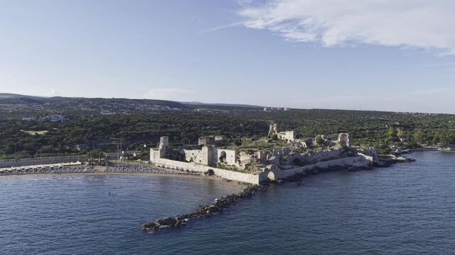 Aerial Drone View of Korykos Castle and Mediterranean Coastline in Mersin, Turkey, Historic Fortress by the Sea at Sunset