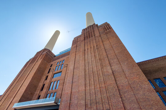 London, UK - 19 June 2026: The twin chimneys and facade of the iconic Battersea power Station. This Art Deco Grade II listed building has been redeveloped to provide shopping and leisure facilities.