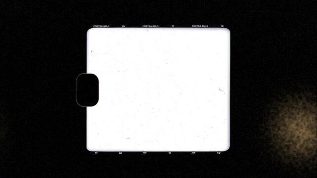 Vintage Super 8 Film Frame Overlay with Authentic Grain and Scratches.