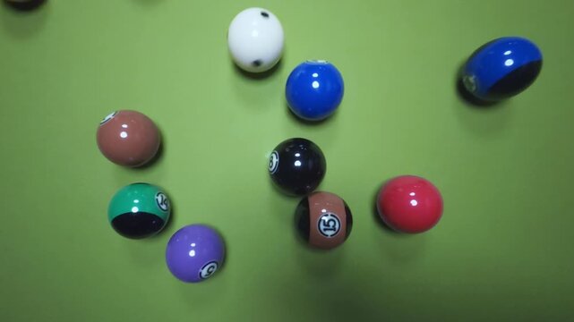 a pool break in a game breaking the balls apart
