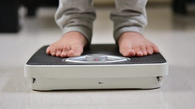 This is a man that doing morning routine weight monitor