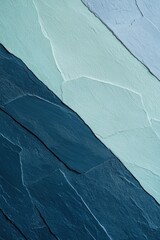 Diagonal bands of slate texture in shades of blue and green