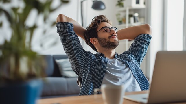 Young adult stretching and resetting during work from home