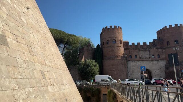 Ancient Pyramid of Caius Cestius and Medieval St Paul Gate in Rome Italy