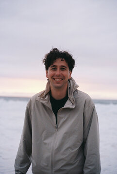 Portrait of a Man Smiling Outdoors at Sunset