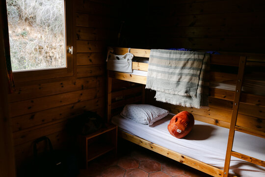 bunk bed in cabin with sleeping bag 