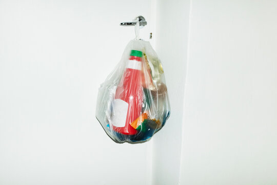 Contemporary image of recycling. Plastic trash inside a plastic bag 