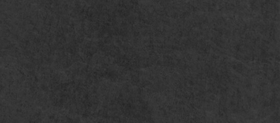 Fototapeta premium Black parchment paper blackboard chalkboard texture. black concrete wall texture vintage grunge charcoal rough, distress backdrop background. Distressed dark black old wall paper grunge background.