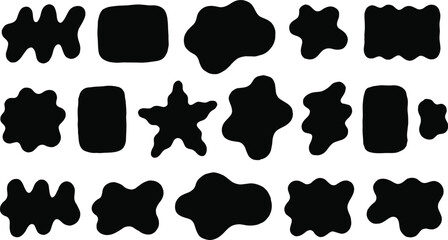 Fototapeta premium Black irregular shapes on white background