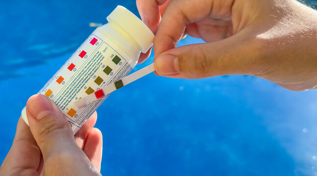 Self-measurement of the water parameters in the pool using test strips. Monitoring the pH of the water, the amount of chlorine and combined chlorine