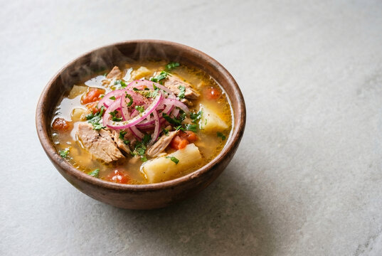 Ecuadorian Encebollado - Fresh Tuna and Yuca Soup in Clay Bowl &ndash; With Copy Space
