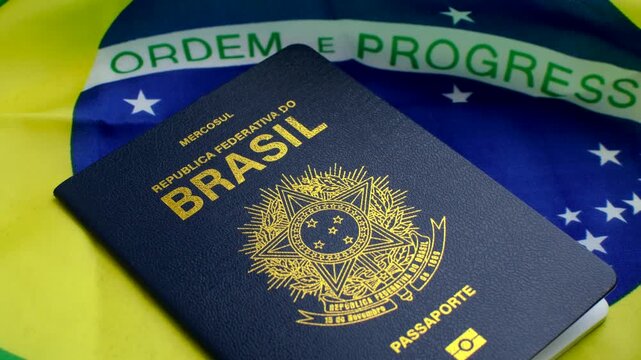 Brazilian Passport on the Flag: A symbol of national identity, the passport rests upon the vibrant flag of Brazil, evoking citizenship and pride.