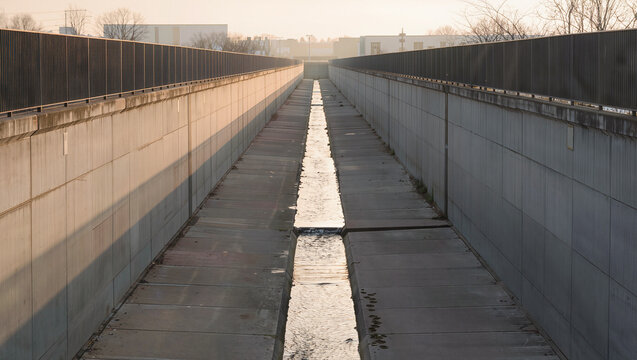 Roadway with concrete median divider.