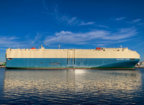 Los Angeles, California USA - March 17, 2026: Vehicle transport ship Valiant Ace, called a Roll On Roll off or Ro Ro transporter in the main channel of Port of Los Angeles, 199 meters, 363 feet long.