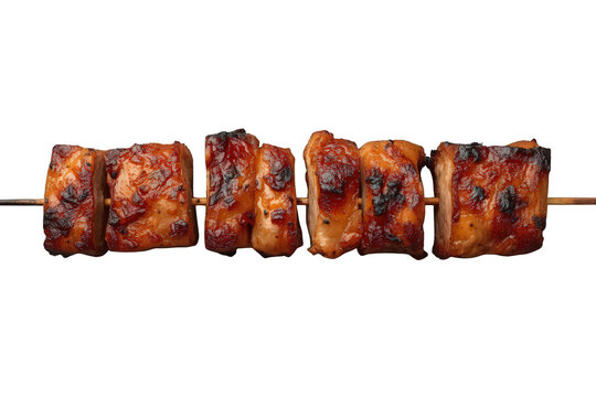 Appetizing grilled chicken shish tawook skewer featuring golden-brown marinated meat pieces with visible char marks, perfect for a barbecue