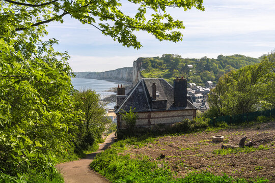 Historic Yport near &Eacute;tretat offers breathtaking cliff landscapes picturesque beaches and authentic coastal charm in Normandy France.