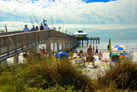 Fort Meyers  Beach Pier Florida FL is a popular tourist snowbird student spring break destination recreation and vacation holiday. 07.01.26