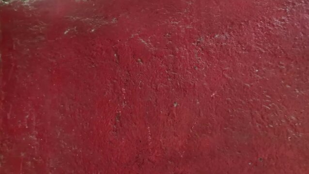 Rough Red Painted Textured Surface Background with Distressed Details