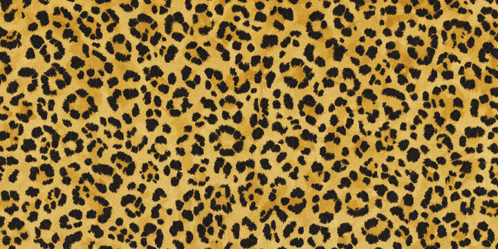 Leopard print pattern with irregular spots and a golden yellow background texture skin animal wildlife