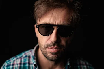 Intense man with sunglasses staring © Viorel Sima