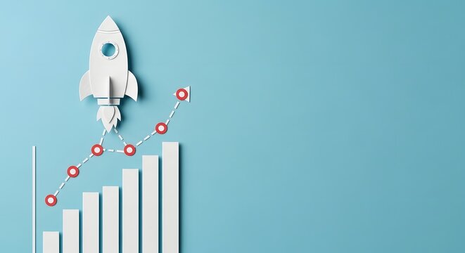 Paper rocket launching from bar graph business growth concept