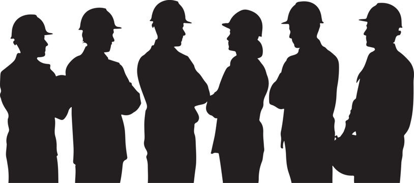 Silhouette of a group of construction workers standing together and talking