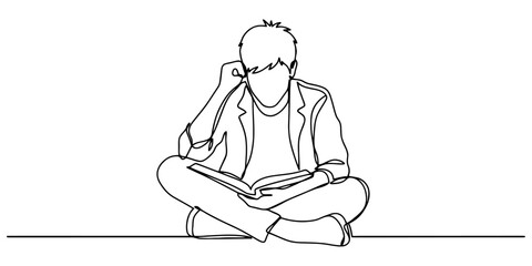 Boy reading a book sitting on the floor - Dibustock