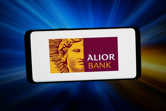 Stuttgart, Germany - 06-22-2026: In this photo illustration, the logo of Polish financial company Alior Bank S.A. is displayed on a smartphone in front of abstract background on computer screen.
