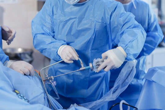 Knee Arthroscopy Procedure with Surgical Instruments in Operating Room