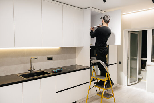 Professional Kitchen Cabinet Installation and Custom Furniture Assembly by Skilled Technician