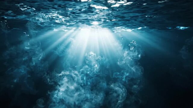 Underwater light rays shine through dark stormy ocean in seamless loop