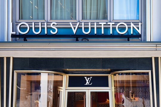 Cologne, Germany June 22 2026: Storefront close-up of the Louis Vuitton luxury brand sign and monogram logo at the elegant entrance next to the Cathedral in Cologne, Germany.