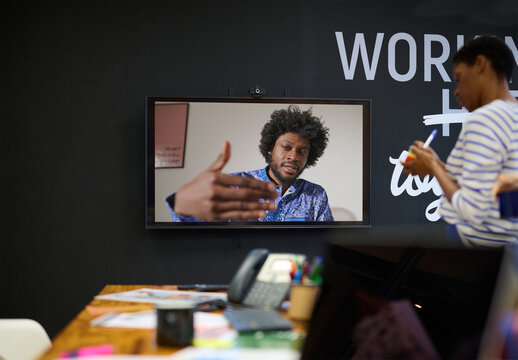 Mockup of Large TV for video call in business office