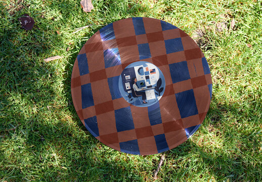 Mockup of Vinyl label Record on Grass Surface