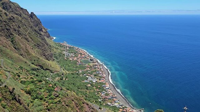 Coastal village of Paul do Mar surrounded by banana plantations from Miradouro do Precipicio, Madeira, Portugal