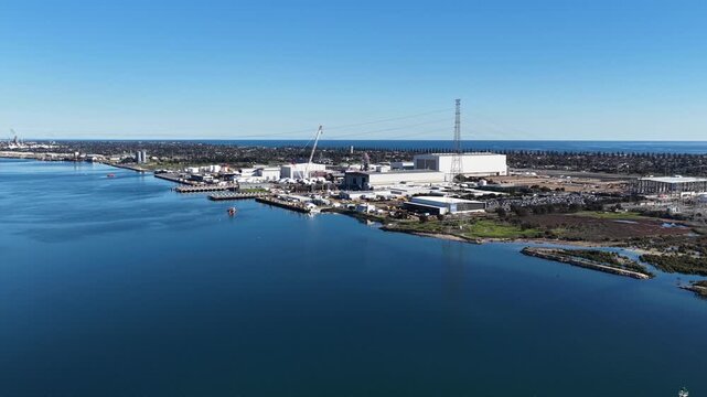 Osborne, Adelaide, South Australia &ndash; 4K aerial drone footage of Port Adelaide River, industrial waterfront, ASC Shipyard, maritime facilities, coastal wetlands and North Haven
