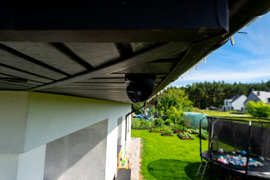 Dome security camera monitoring home backyard privacy