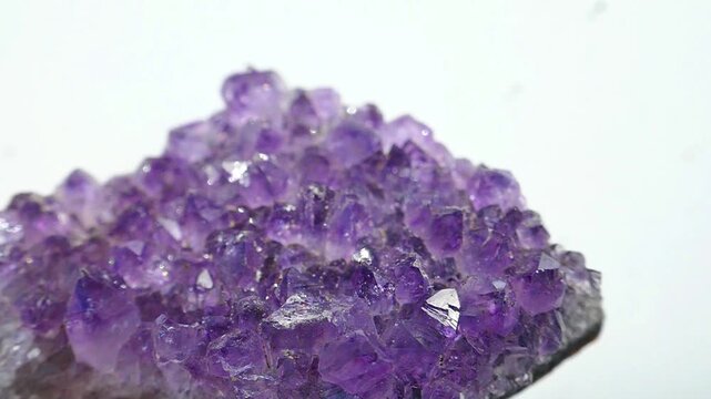 amethyst geode with sparkling purple crystals. Purple crystals.Radiant texture of agate stone. 4k footage