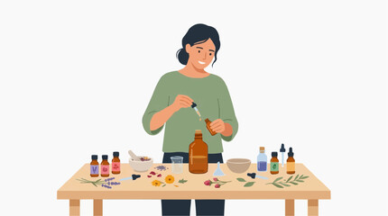 Fototapeta premium Woman creating natural essential oils with herbs and flowers on a wooden table