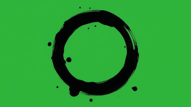 Black ink brush stroke circle isolated on green screen chroma key background.