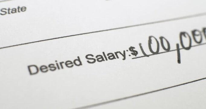 Different angles of job applicant filling out a document showing desired salary and writing a large payment. Closeup of pen writing on employment paperwork asking desirable wages for a job.